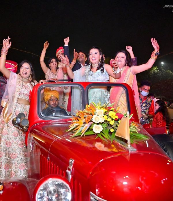 sisters on vintage car for marriage